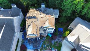 arial drone image of a roof replacement with asphalt shingles by Skyline Contracting in Gainesville, GA