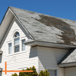 damaged shingles in need of a roofing repair project