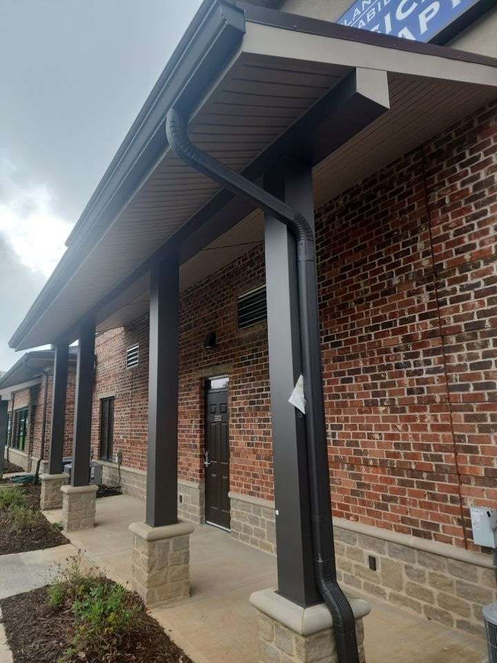 close up of brick building before a roof replacement project