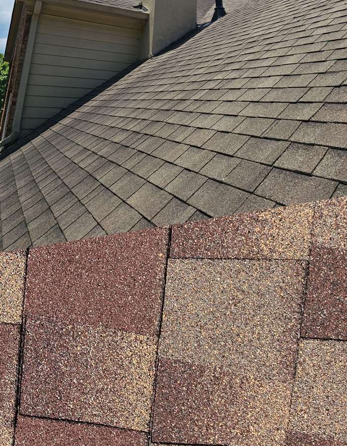 close up of shingles showing signs that it may be time for a new residential roof