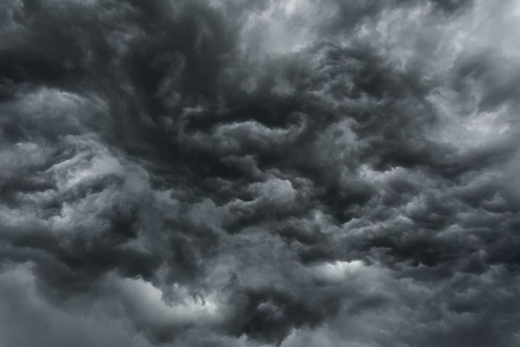 dark storm clouds gathering overhead