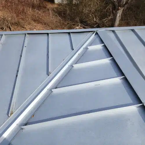 Clean standing seam metal roof showing correct panel alignment and seam structure for metal roof repair by Skyline Contracting in GA