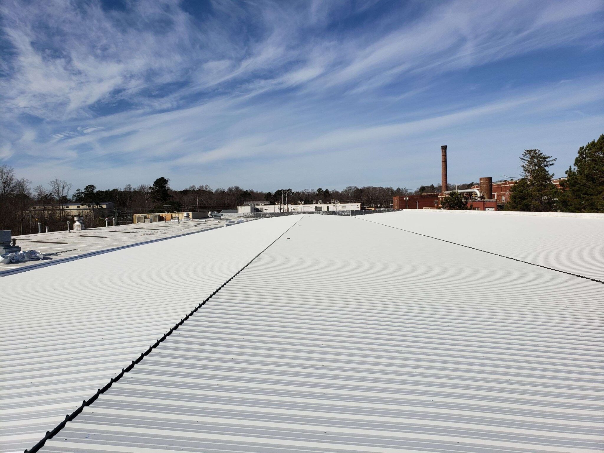 Photo of recently completed roof by Gainesville GA's top metal roofing contractor near me