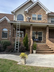 Professional roof inspection being completed by Skyline Contracting on a two story home in Gainesville, GA