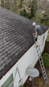 Professional roof inspection identifying gutter issues on a Gainesville, GA home by Skyline Contracting