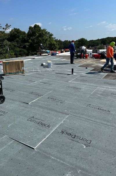 a commercial roof replacement in progress in Gainesville, GA