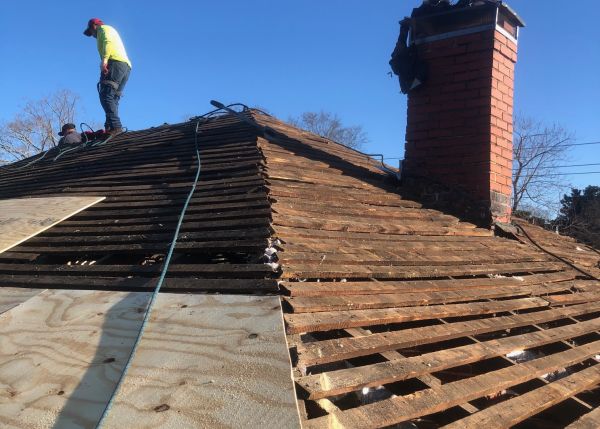 the roof of a historic home during the replacement process