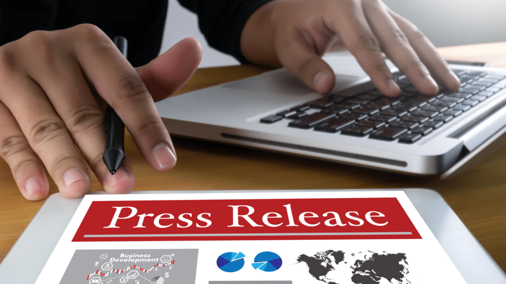 Person working on computer pointing to press release Skyline Contracting press release Gainesville, GA