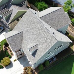 Aerial view of a house with grey roof by roof installation company in Gainesville, GA