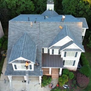 House with grey roof and white siding in Gaibesville, GA