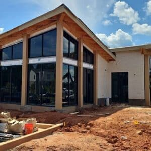 Building with exposed wooden beams in a process of Skyline Contracting commercial roofing services in Gainesville, GA