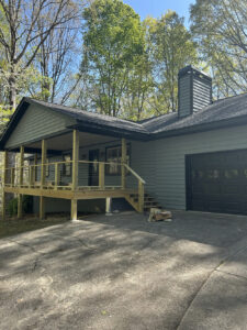 Newly Constructed Front Deck with Stairs and gable roof by Skyline Contracting in Gainesville, GA