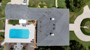 Aerial view of residential roof and property, emphasizing inspection points and questions to ask a roofing contractor by Skyline Contracting