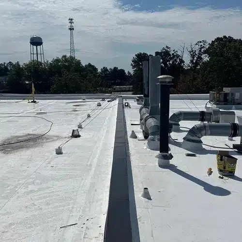 Commercial rooftop with HVAC units and drains inspected by Skyline Contracting in Gainesville, GA