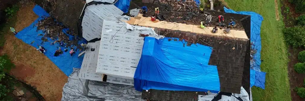 Aerial view of wood shake roof replacement and maintenance work by Skyline Contracting in GA