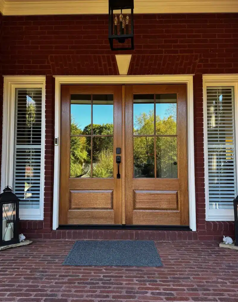 Elegant entry door and window installation showcasing professional craftsmanship and energy-efficient design by Skyline Contracting