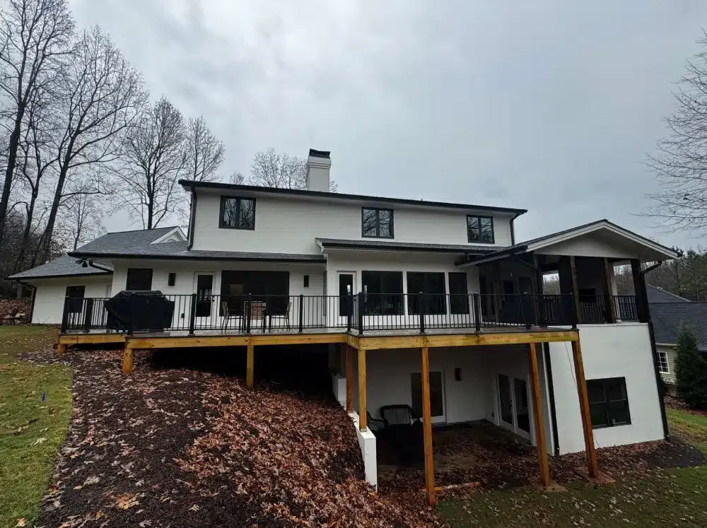 Full exterior home remodeling featuring upgraded siding, windows, and deck by Skyline Contracting in Gainesville, GA