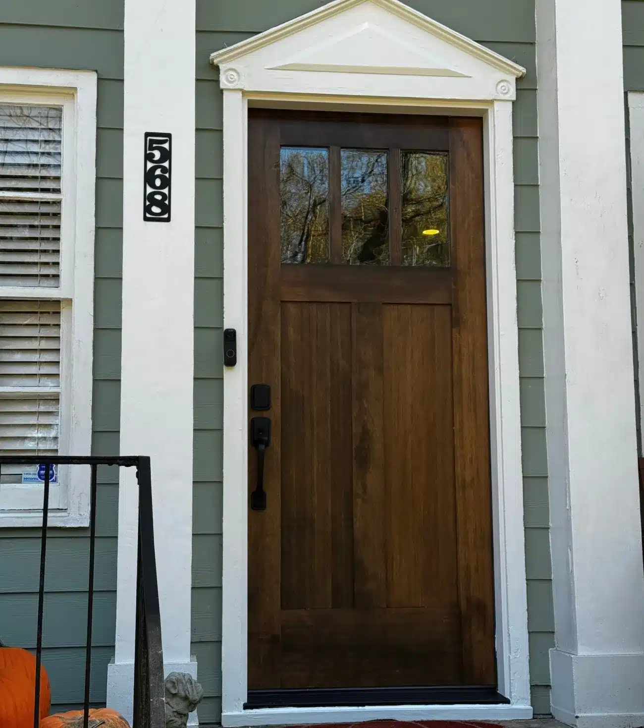 Completed wood front door after professional window & door installation by Window & Door Installation Gainesville | Skyline Contracting