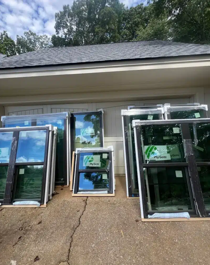 Energy-efficient double-hung and casement windows ready for installation by Skyline Contracting