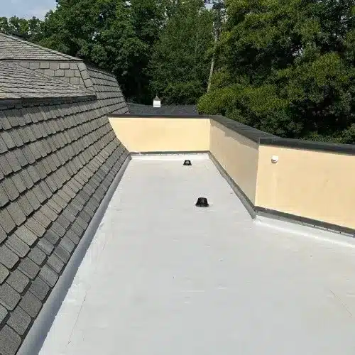 Reflective white TPO flat roofing system installed for improved energy efficiency by Skyline Contracting | Roofing Contractor & Remodeler in GA