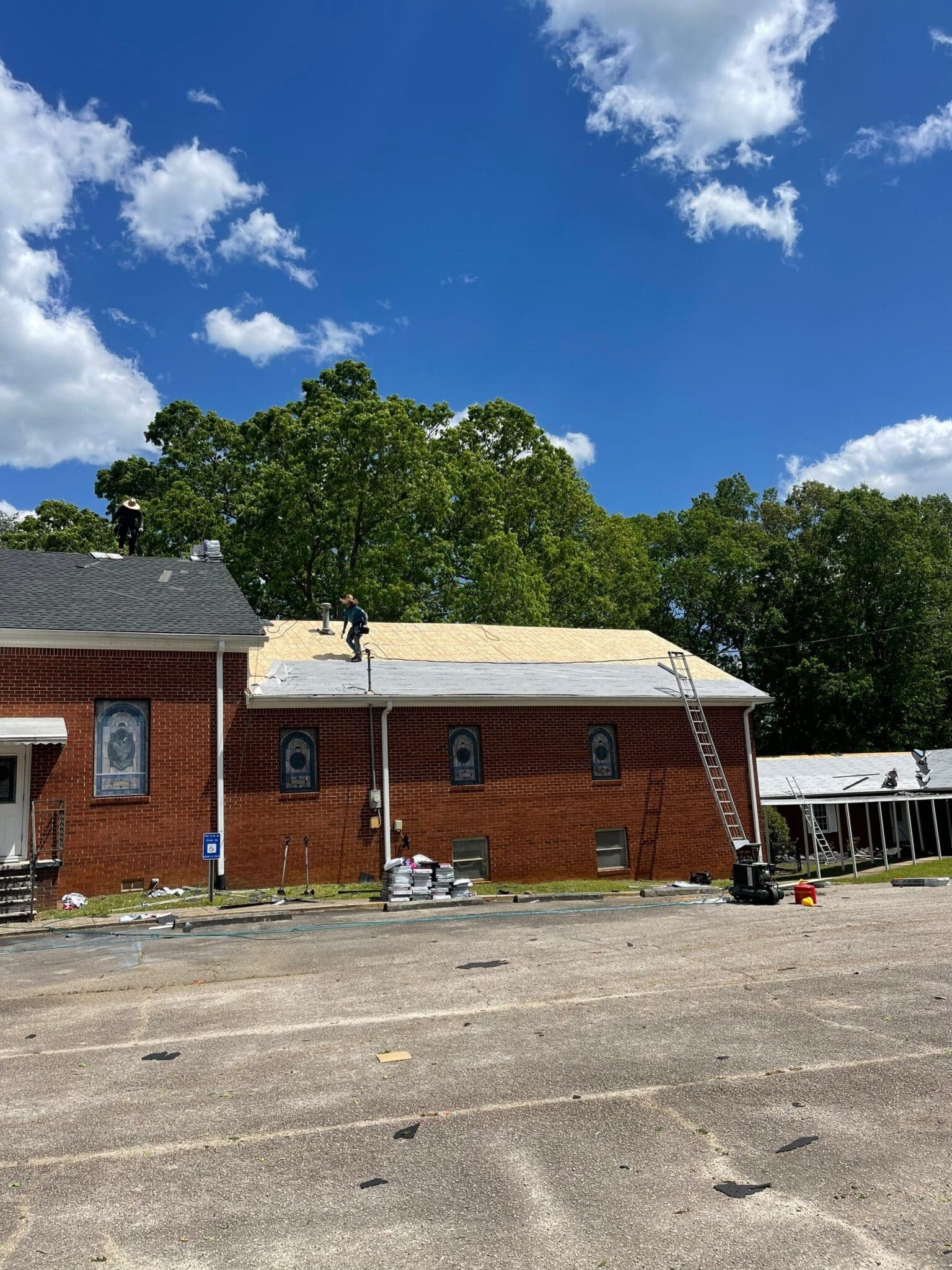 Church roof replacement with stained glass windows church roofing contractor service in Gainesville GA by Skyline Contracting