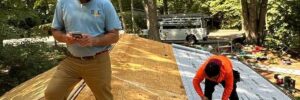 Roofer installing underlayment over new roof decking, CertainTeed Select ShingleMaster roof installation in Gainesville, GA by Skyline Contracting